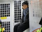 Swedish activist Greta Thunberg sits inside a police van, according to solicitors acting on her behalf, as she was arrested at a pro-Palestinian protest for holding a sign that said she supported prisoners linked to Palestine Action, an organisation which the British government has proscribed as a terrorist group, in London, Britain, December 23, 2025