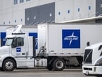 Medline delivery trucks in the loading dock area at the company's warehouse in Tracy, California, US. Medline delivery trucks in the loading dock area at the company's warehouse in Tracy, California, US.