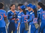 India's captain Harmanpreet Kaur with teammates. India's captain Harmanpreet Kaur with teammates.
