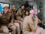 West Karbi Anglong: Injured security personnel sit inside an ambulance following violence allegedly triggered by rumours, in West Karbi Anglong, Assam, Tuesday, Dec. 23, 2024.