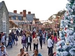 Tourists strolling on the Ridge, in Shimla, on Tuesday. (PTI)