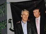 A banner of Jeffrey Epstein and President Donald Trump displayed during a protest earlier this year.