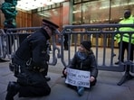 A handout photograph taken on and released by Prisoners for Palestine in London on December 23, 2025 shows Swedish activist Greta Thunberg before her arrest by police outside the offices of Aspen Insurance at Plantation Place on Fenchurch Street on Tuesday. 