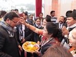 Chief Minister Pushkar Singh Dhami at the Uttarakhand Mahakauthig venue in Noida, where artists and community groups presented folk music, dance and traditional crafts during the event.