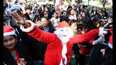 Devotees participating in the procession organised by the Tricity Churches Association ahead of Christmas in Chandigarh on Tuesday. (Keshav Singh/HT)