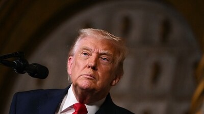 US President Donald Trump takes questions from journalists at Mar-a-Lago in Palm Beach, Florida. (AFP)