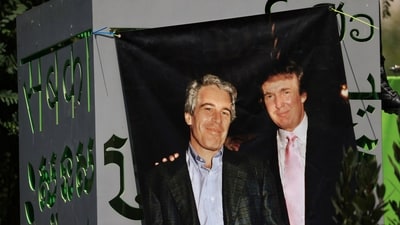 A banner of Jeffrey Epstein and President Donald Trump displayed during a protest earlier this year. (REUTERS)