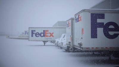FedEx addressed claims of increased H-1B hiring amid layoffs, stating its visa holders make up a minimal portion of its workforce. (AFP) FedEx addressed claims of increased H-1B hiring amid layoffs, stating its visa holders make up a minimal portion of its workforce. (AFP)