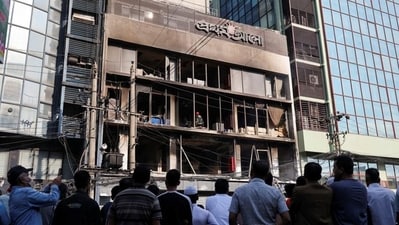 Fresh unrest has rocked Bangladesh after the death of a prominent student leader - Sharif Osman Hadi - last week. In pic: People gather to look at the building of the vandalised office of Prothom Alo newspaper, following the death of Sharif Osman Hadi, a student leader, who was shot the head, in Dhaka, Bangladesh (Reuters) Fresh unrest has rocked Bangladesh after the death of a prominent student leader - Sharif Osman Hadi - last week. In pic: People gather to look at the building of the vandalised office of Prothom Alo newspaper, following the death of Sharif Osman Hadi, a student leader, who was shot the head, in Dhaka, Bangladesh (Reuters)