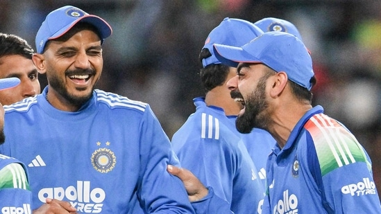 India's Virat Kohli shares a light moment with Axar Patel on the field. (AFP)