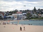 A police helicopter patrols over the Bondi Beach as life gradually returns to normal following seven days of mourning, a week after the Bondi Beach shooting attack, in Sydney A police helicopter patrols over the Bondi Beach as life gradually returns to normal following seven days of mourning, a week after the Bondi Beach shooting attack, in Sydney