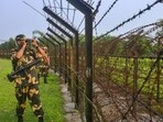 Border Security Force (BSF) personnel stand guard along the India-Bangladesh border on the outskirts of Siliguri, (PTI FILE/Representative Image) Border Security Force (BSF) personnel stand guard along the India-Bangladesh border on the outskirts of Siliguri, (PTI FILE/Representative Image)