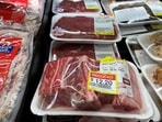 Customers shop for groceries at a Walmart Supercenter retail store in North Bergen, New Jersey