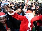 Devotees participating in the procession organised by the Tricity Churches Association ahead of Christmas in Chandigarh on Tuesday. (Keshav Singh/HT) Devotees participating in the procession organised by the Tricity Churches Association ahead of Christmas in Chandigarh on Tuesday. (Keshav Singh/HT)