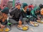 Mid-day meal served to students at a government school in Ludhiana on Tuesday. (HT Photo)