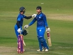 Vaibhav Suryavanshi celebrates his century with Ayush Anand Loharuka.