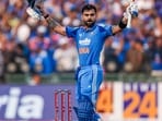 Virat Kohli celebrates his century during the second ODI match against South Africa.