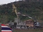 The Vishnu statue, built in 2014, was toppled by a bulldozer by Thai military engineers. The Vishnu statue, built in 2014, was toppled by a bulldozer by Thai military engineers.