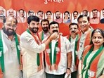 Shiv Sena (UBT) leaders Prithviraj Sutar, Sanjay Bhosale and Ashwini Bhosale joined the Bharatiya Janata Party on Tuesday. (HT) Shiv Sena (UBT) leaders Prithviraj Sutar, Sanjay Bhosale and Ashwini Bhosale joined the Bharatiya Janata Party on Tuesday. (HT)