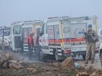 A Turkish soldier patrols as search and rescue operations continue at the wreckage site following the crash of a Libya-bound business jet carrying Libyan Chief of Staff General Muhammad Ali Ahmed Al-Haddad.