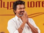 TVK leader Vijay at a gathering during a public meeting held in Kanchipuram recently.(PTI )