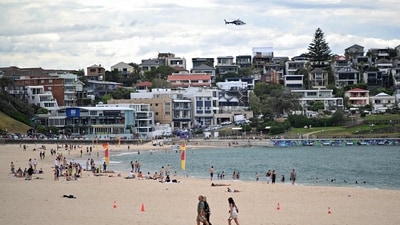 A police helicopter patrols over the Bondi Beach as life gradually returns to normal following seven days of mourning, a week after the Bondi Beach shooting attack, in Sydney (AFP/File) A police helicopter patrols over the Bondi Beach as life gradually returns to normal following seven days of mourning, a week after the Bondi Beach shooting attack, in Sydney (AFP/File)
