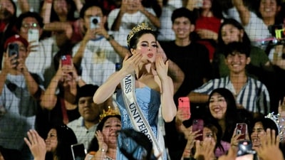 Miss Universe 2025 Mexican Fatima Bosch blows kisses to the crowd in Villahermosa, Tabasco state, Mexico on December 14, 2025. (REUTERS)