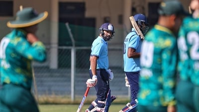 Rohit Sharma, centre, and Angkrish Raghuvanshi after their team won the Vijay Hazare Trophy 2025/26 cricket match against Sikkim (PTI) Rohit Sharma, centre, and Angkrish Raghuvanshi after their team won the Vijay Hazare Trophy 2025/26 cricket match against Sikkim (PTI)