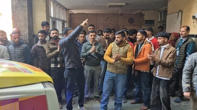 People protest after a video of a doctor allegedly assaulting a patient, who was lying on a hospital bed, at Indira Gandhi Medical College (IGMC), went viral, outside the hospital in Shimla, on Monday. (HT Photo) People protest after a video of a doctor allegedly assaulting a patient, who was lying on a hospital bed, at Indira Gandhi Medical College (IGMC), went viral, outside the hospital in Shimla, on Monday. (HT Photo)