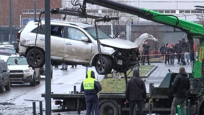 A crane loads a car onto a platform at the scene where Lt. Gen. Fanil Sarvarov was killed by an explosive device placed under his car in Moscow. (AP) A crane loads a car onto a platform at the scene where Lt. Gen. Fanil Sarvarov was killed by an explosive device placed under his car in Moscow. (AP)