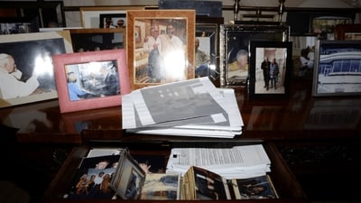 A view of drawers and framed photos, including of Donald Trump, in Jeffrey Epstein's Manhattan home is seen in this image released by the Department of Justice in Washington, D.C., U.S., on December 19, 2025 as part of a new trove of documents from its investigations into the late financier and convicted sex offender Jeffrey Epstein. (via REUTERS)