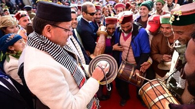 Dhami joins local artists in a traditional welcome during the inauguration of the Kedarkantha Winter Festival in Sankri.