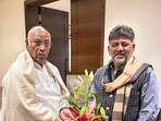 Deputy chief minister DK Shivakumar meets AICC President Mallikarjun Kharge at his residence, in Bengaluru. (@DKShivakumar)