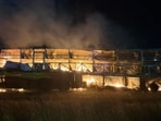 After the bus collided with the speeding truck, eyewitnesses rushed to the scene to pull out the passengers from the bus, which was ablaze.