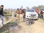Police officials at encounter site in Jalandhar. (HT)