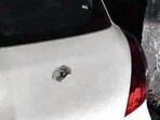 The acting sarpanch’s car with a bullet mark on the boot near Doraha in Ludhiana on Thursday. (HT Photo) The acting sarpanch’s car with a bullet mark on the boot near Doraha in Ludhiana on Thursday. (HT Photo)