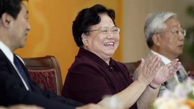 File photo of Peng Peiyun (C), who was the former head of China's one-child policy. (REUTERS)