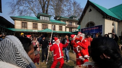 Children dress up as Santa Claus as Srinagar celebrates the joy of Christmas on Thursday. (Mukhtar Khan/AP) Children dress up as Santa Claus as Srinagar celebrates the joy of Christmas on Thursday. (Mukhtar Khan/AP)