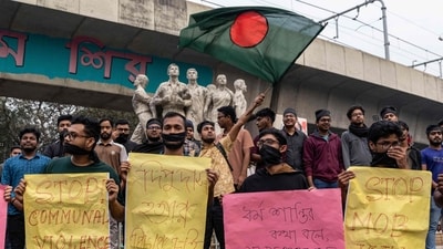 His resignation might not come as a surprise, as calls for him to step down from his position were made by Inqilab Moncho, a mass cultural movement formed during last year's July Uprising (AFP)