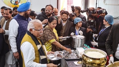 Manohar Lal Khattar and Rekha Gupta have a meal as they inaugurate an 'Atal Canteen' on the birth anniversary of former prime minister Atal Bihari Vajpayee. (PTI) Manohar Lal Khattar and Rekha Gupta have a meal as they inaugurate an 'Atal Canteen' on the birth anniversary of former prime minister Atal Bihari Vajpayee. (PTI)