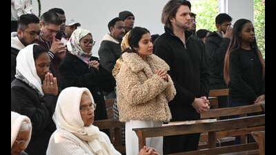 Devotees offering prayers at the Sector-19 church on Thursday afternoon. (Sanjeev Sharma/HT)