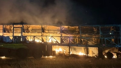 The impact caused the sleeper coach to catch fire in the middle of the highway, trapping several passengers inside. (PTI/Representative image)