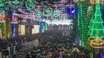 Kolkata: People gather during the Christmas festival celebration at illuminated Park Street, in Kolkata, India (PTI) Kolkata: People gather during the Christmas festival celebration at illuminated Park Street, in Kolkata, India (PTI)