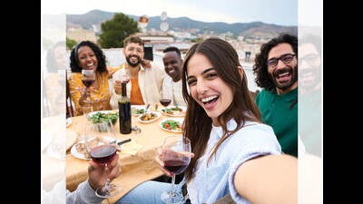 Reconnecting with old friends — even on a WhatsApp group — can make you feel years younger. (SHUTTERSTOCK) Reconnecting with old friends — even on a WhatsApp group — can make you feel years younger. (SHUTTERSTOCK)