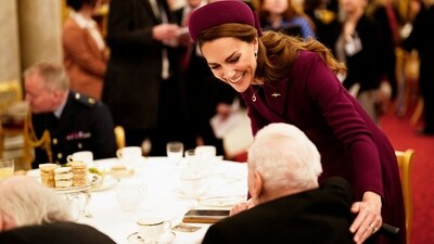 Britain's Catherine, Princess of Wales (rear) speaks with a Second World War veteran during a tea party at Buckingham Palace on May 5, 2025 to celebrate the 80th anniversary of VE Day also known as Victory in Europe Day, marking the end of the Second World War in Europe. (AFP) Britain's Catherine, Princess of Wales (rear) speaks with a Second World War veteran during a tea party at Buckingham Palace on May 5, 2025 to celebrate the 80th anniversary of VE Day also known as Victory in Europe Day, marking the end of the Second World War in Europe. (AFP)