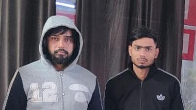 The arrested men in police custody.