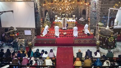 New Delhi: Christian devotees gather to offer prayers during the Christmas morning service, at Holy Trinity Church, Turkman Gate, New Delhi, Thursday, Dec. 25, 2025. (PTI Photo/Salman Ali)(PTI12_25_2025_000203B) (PTI) New Delhi: Christian devotees gather to offer prayers during the Christmas morning service, at Holy Trinity Church, Turkman Gate, New Delhi, Thursday, Dec. 25, 2025. (PTI Photo/Salman Ali)(PTI12_25_2025_000203B) (PTI)
