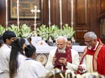Prime Minister Narendra Modi greets as he arrives during the Christmas morning service at the Cathedral Church of the Redemption, in New Delhi. Prime Minister Narendra Modi greets as he arrives during the Christmas morning service at the Cathedral Church of the Redemption, in New Delhi.