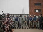 Law enforcement officers stand guard outside the National Martyrs' Memorial before the arrival of Bangladesh Nationalist Party (BNP) acting chairman Tarique Rahman in Savar, on the outskirts of Dhaka, Bangladesh, December 26. (REUTERS)