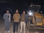 The district police on Thursday caught two JCB machines on shamlat land in Rattewali village. (HT Photo)